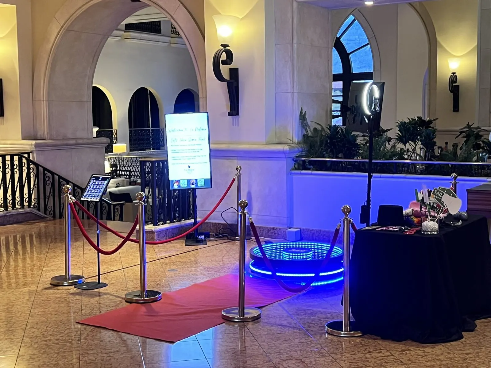 360 video booth in a grand hotel lobby