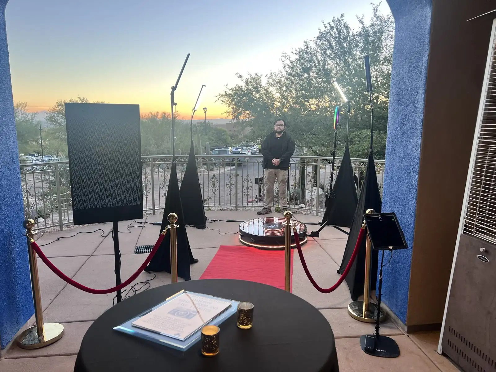 360 video booth at a rooftop event at sunset